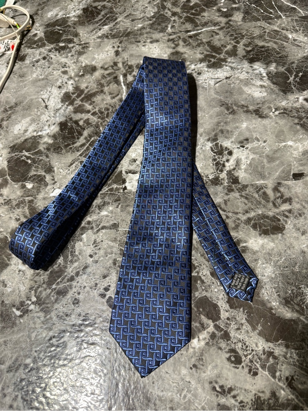 Men’s WeiShang tie in purple/blue/black geometric print